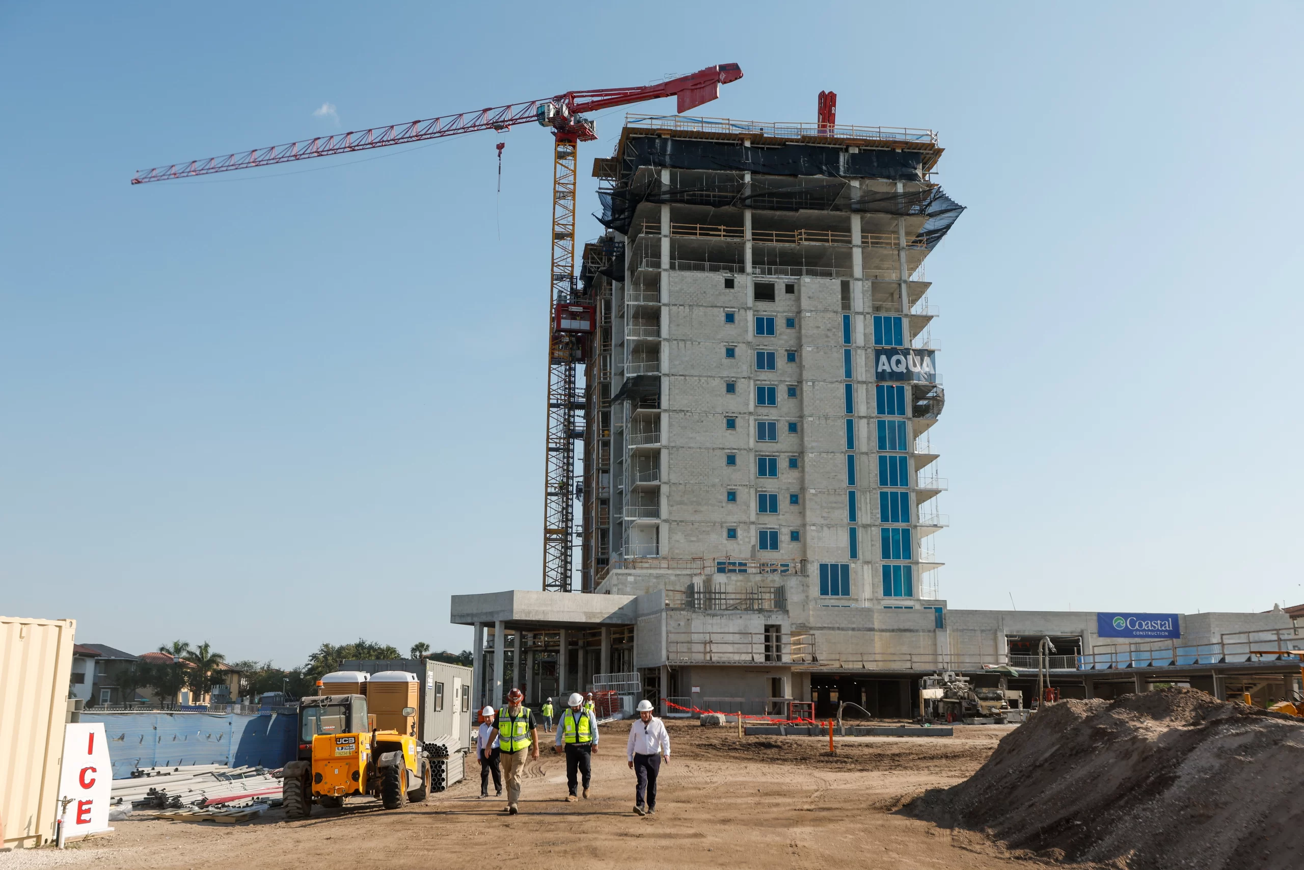 Construction tops out on 17 story luxury condo, AQUA at West Shore ...